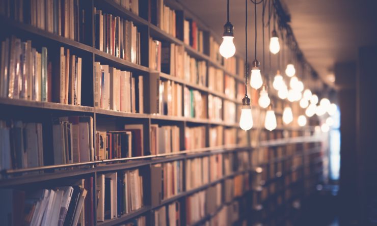 wide shot photograph of a bookshelf