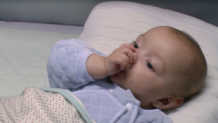 A baby with vulcan ears in a screenshot from Star Trek: Enterprise "Demons"